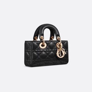 Black Quilted Handbag with Gold Accents